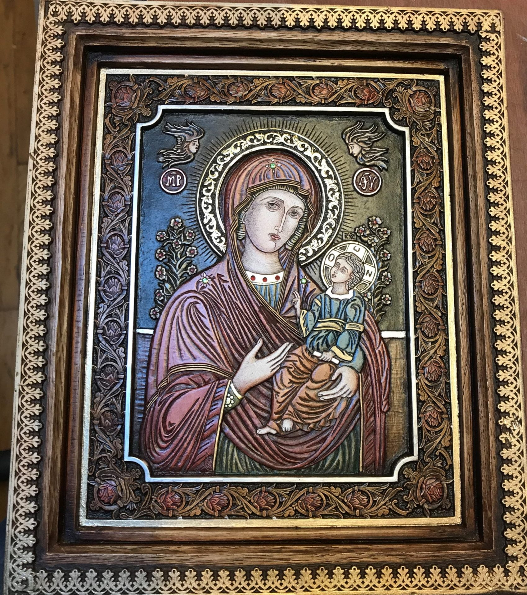 Ancient icon of the Virgin Mary. Restoration.
